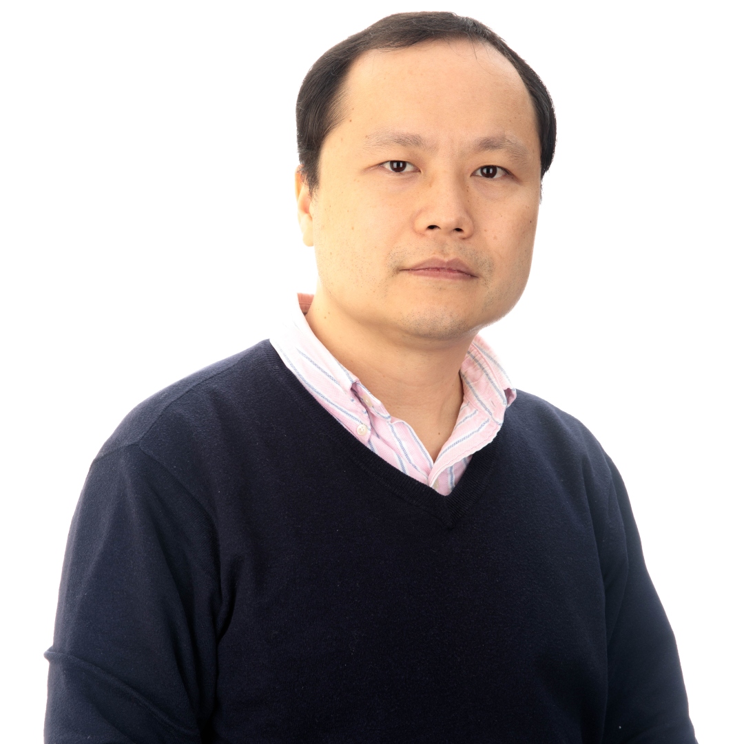 Professor of Statistics, Yinglei Lai, in a blue sweater